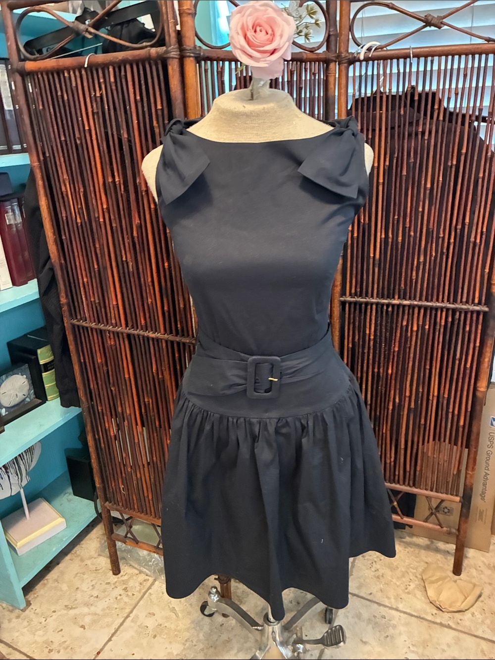 Women’s lovely shorty dress black made in Romania. Size 40 which is an 8 in U.S.